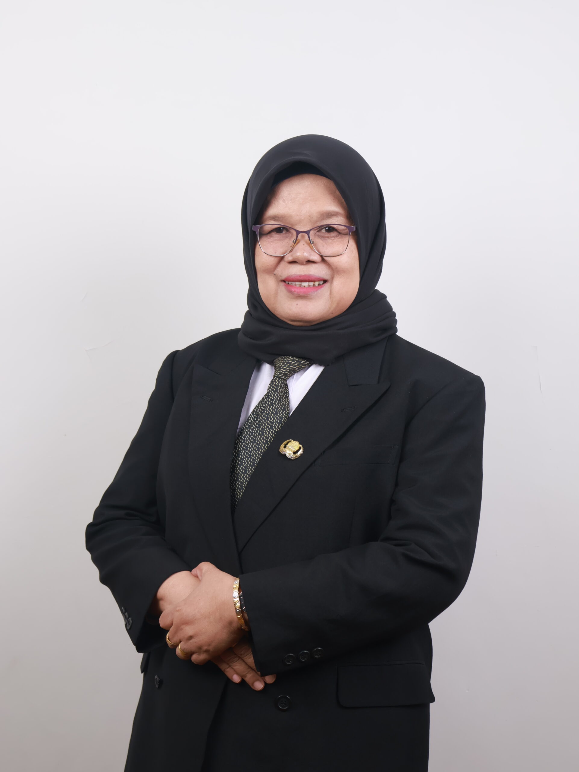 Dra. Tita Rosyati, MM