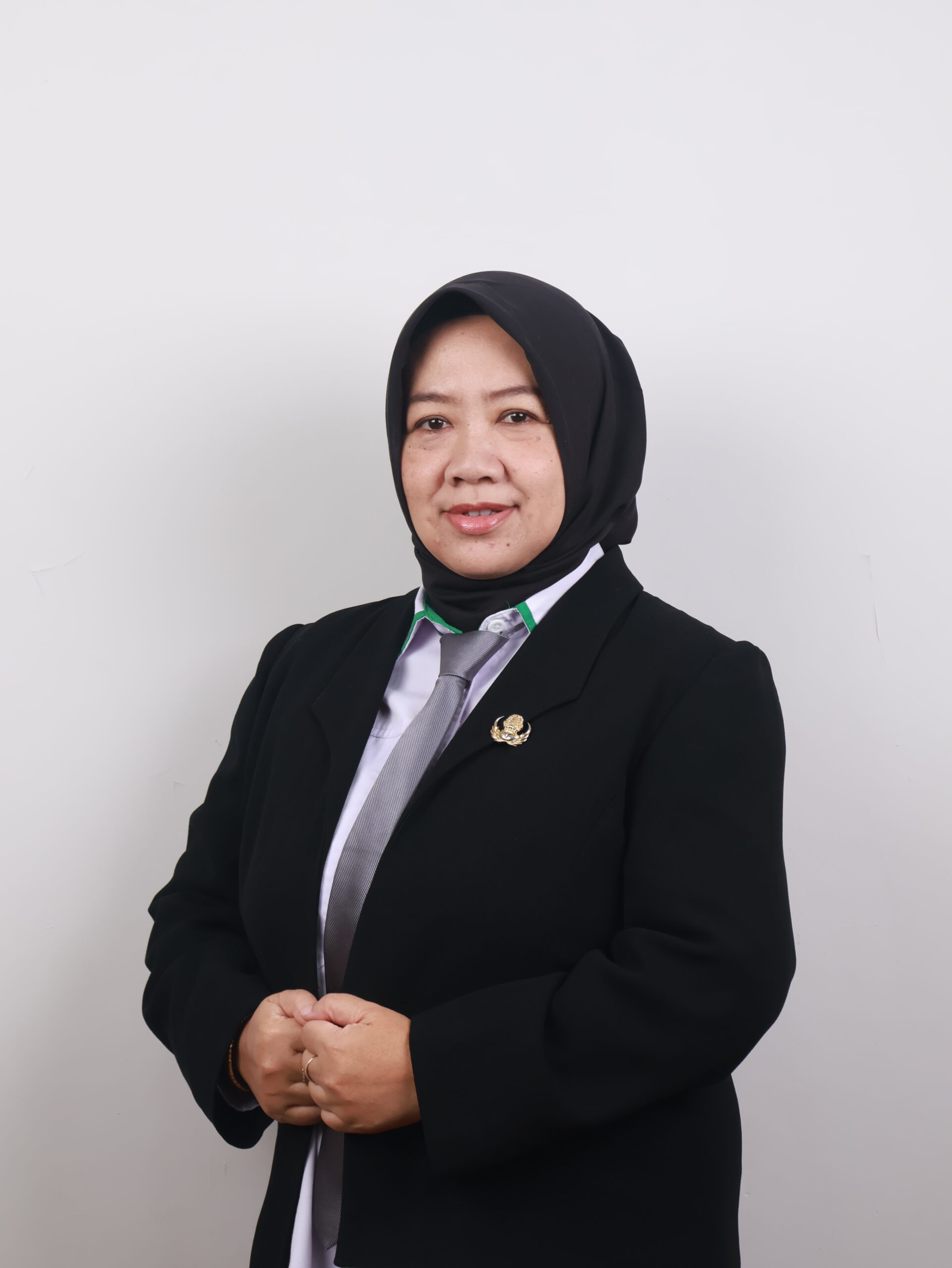 Lia Emilia, S.Pd.,M.M