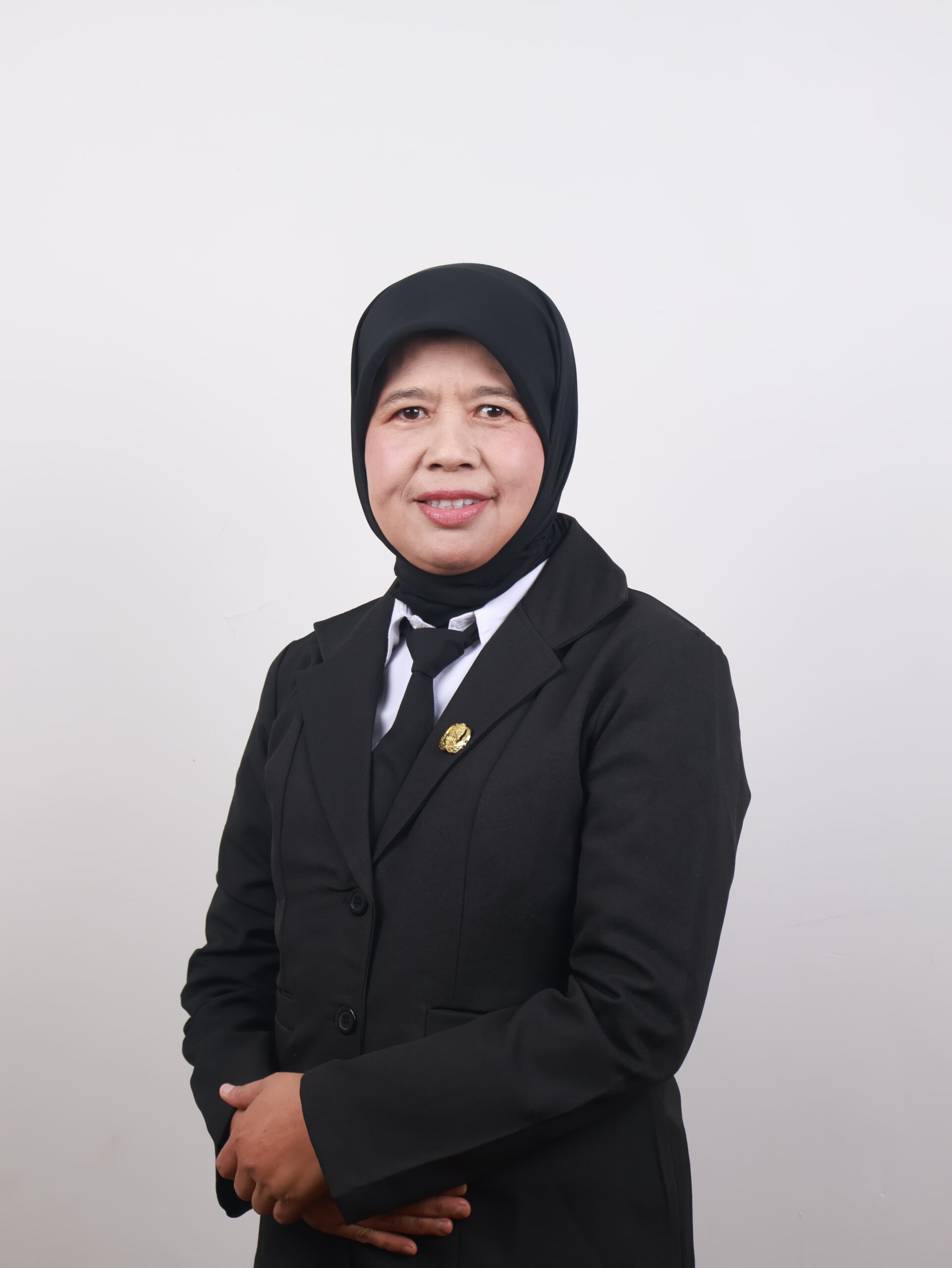 Dra. Tutik Suryani, MM